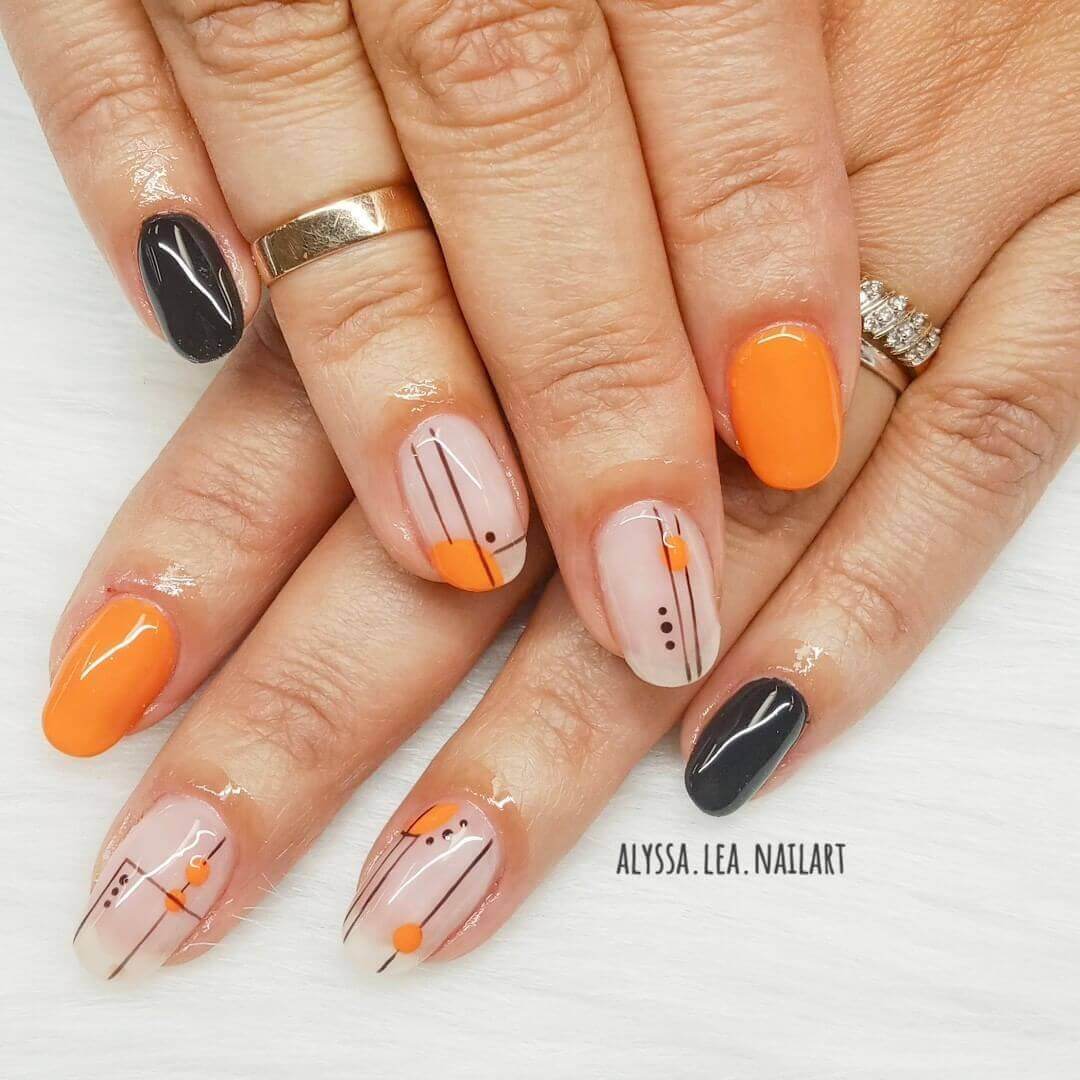 diseño simpl de uñas color naranja