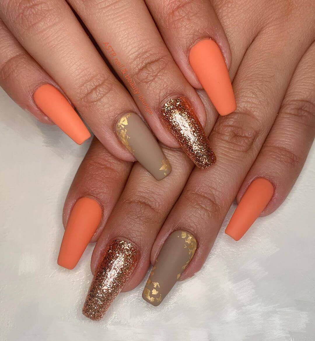matte orange with gold nails
