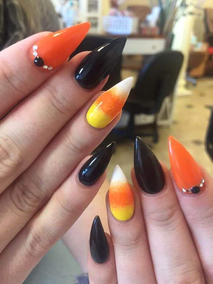 orange nails with black ombre