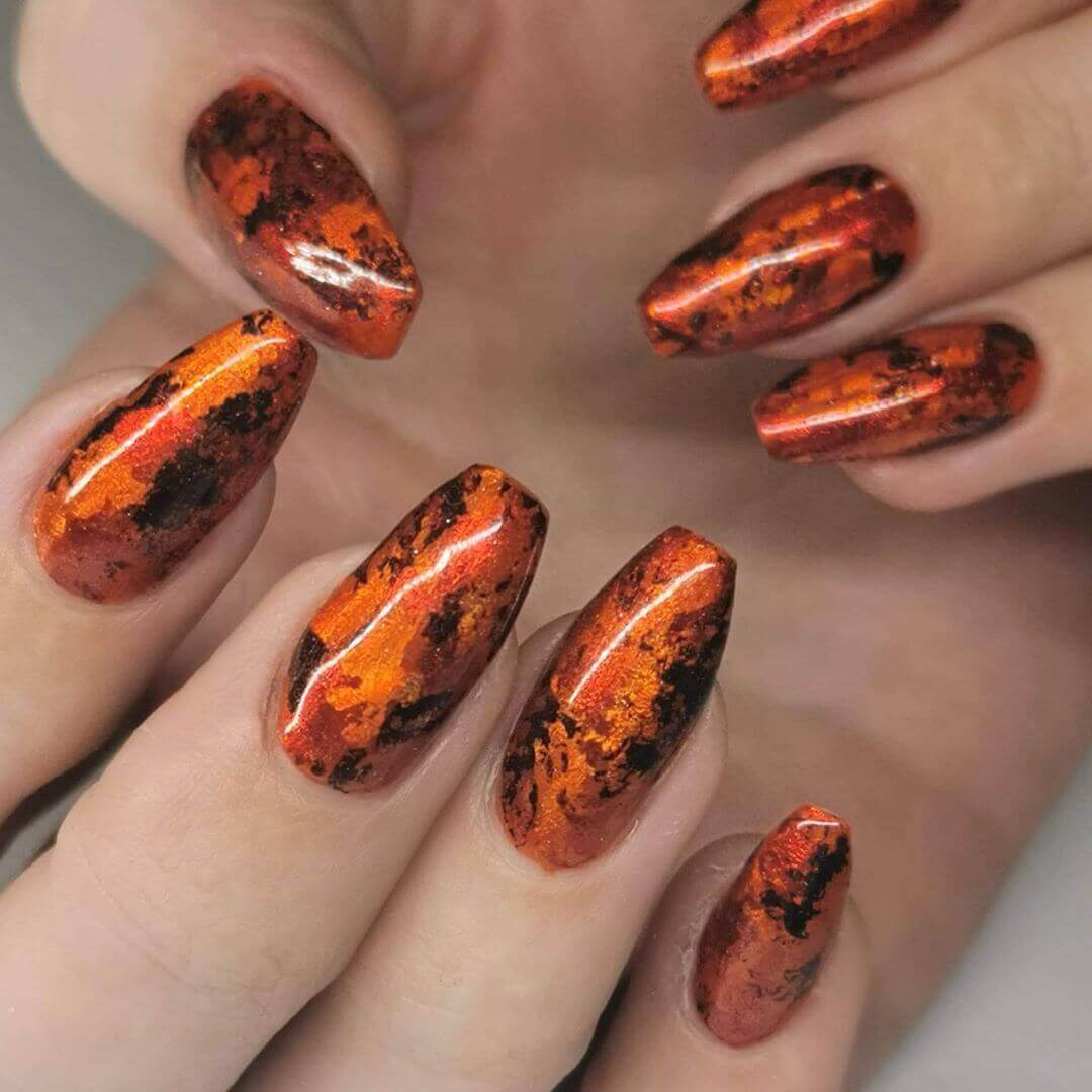 orange nails marbled effect